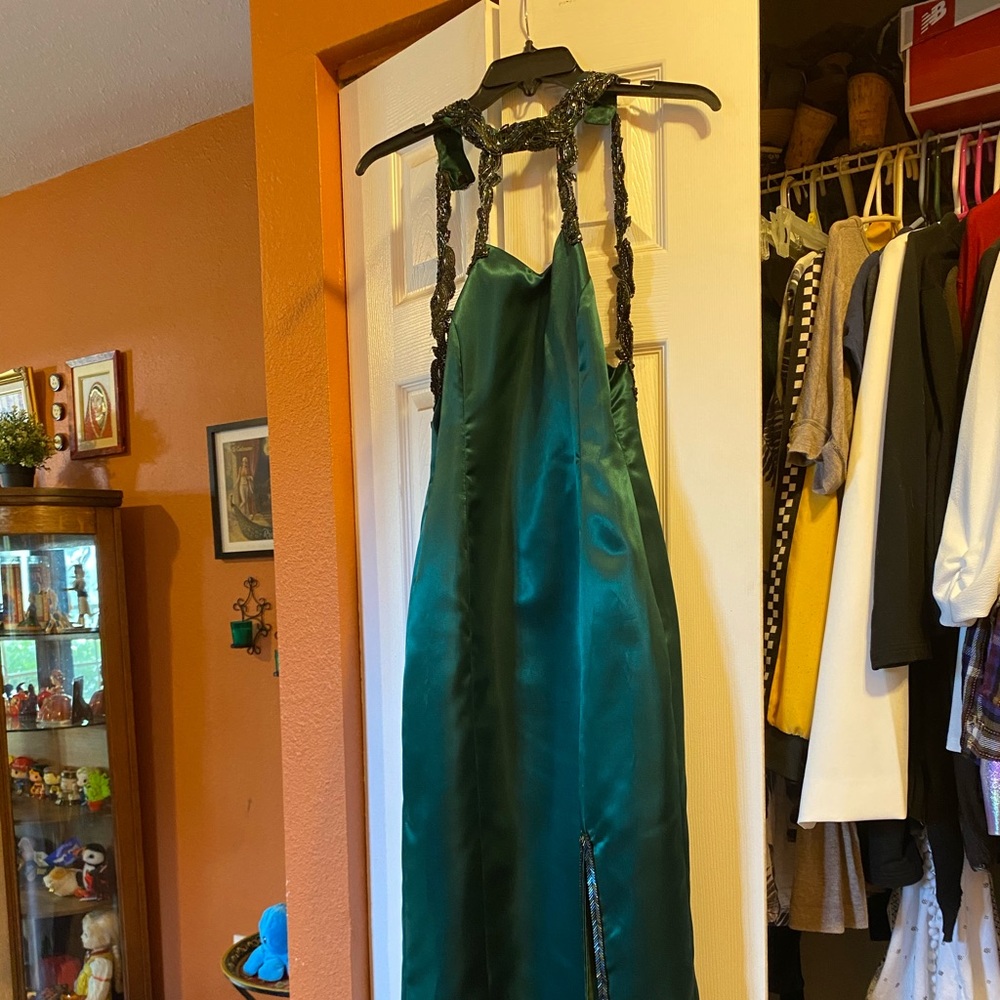 Emerald green satin evening gown